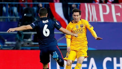 Atletico Madrid’s midfielder Koke (L) in action against FC Barcelona’s Argentinian striker Lionel Messi (R) during the Uefa Champions League quarter-final, second leg match between Atletico Madrid and FC Barcelona at Vicente Calderon stadium in Madrid, Spain, 13 April 2016. EPA/JUANJO MARTIN