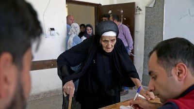 A Kurdish elderly woman in traditional clothes prepares to vote during the Kurdistan parliamentary election at a polling station in Erbil, the capital of the Kurdistan Region in Iraq. With over three million people eligible to vote, the semi-autonomous region is voting on its parliamentary elections a year after a failed bid for independence from Iraq. EPA