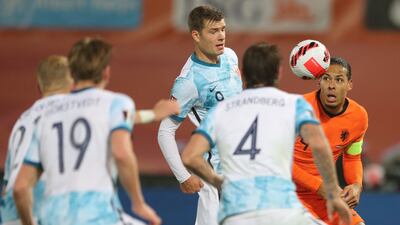 Norway's Alexander Sorloth in action with Netherlands' Virgil van Dijk. AP Photo