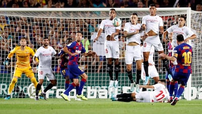 Messi scores the fourth goal for Barcelona against Sevilla on October 6, 2019. EPA