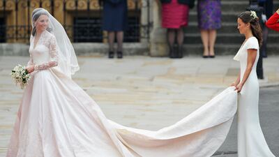 Catherine and her sister and maid of honour Pippa Middleton enter Westminster Abbey for the royal wedding on April 29, 2011