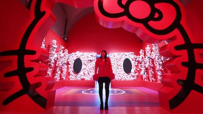 A gallery worker poses at the preview for the Cute exhibition at Somerset House in London, UK. EPA
