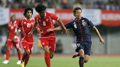 The UAE national team in action against Japan during a friendly match