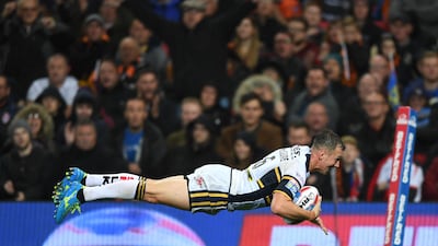 Danny McGuire of Leeds Rhinos scores the second try during the Betfred Super League Grand Final match against Castleford Tigers at Old Trafford in England. Gareth Copley / Getty Images