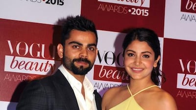 This file photograph taken on July 20, 2015, shows Indian actress Anushka Sharma, right, and Indian cricketer Virat Kohli at the Vogue Beauty Awards ceremony in Mumbai. AFP / STR