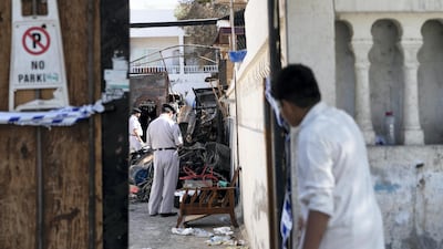 Overcrowding and the careless storage of goods is to blame for countless fires, officials said. Pictured is the aftermath of a blaze in the Maysaloon neighbourhood of Sharjah in 2018. Reem Mohammed / The National