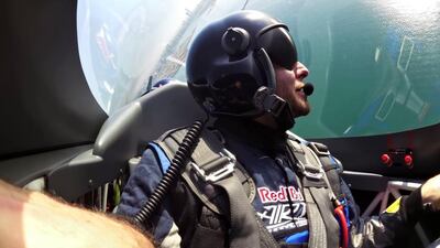 Reporter Emmanuel Samoglou in a Red Bull plane over Abu Dhabi. Courtesy Red Bull