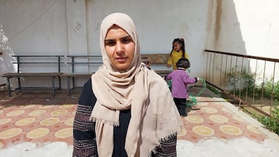 Nariman Dalool now has to look after her four children without her husband, who was killed by an Israeli sniper. Mohamed Amra for The National