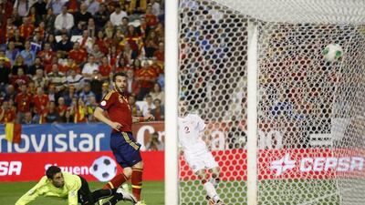 Manchester City forward Alvaro Negredo scores in the 26th minute to put Spain ahead on Tuesday night. Juan Medina / Reuters