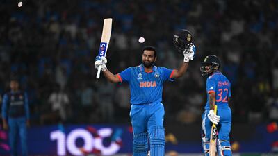India's captain Rohit Sharma celebrates after scoring his century against Afghanistan in the Cricket World Cup match at the Arun Jaitley Stadium in New Delhi on October 11, 2023. AFP