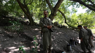 Members of the anti-Iranian group, Kurdistan Free Life Party (PJAK), are seen at their base deep on the Iraq-Iran border of northern Iraq's Kurdish autonomous region on August 28, 2017. Safin Hamed / AFP
