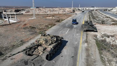 Syrian army equipment and vehicles abandoned on the motorway to Damascus, near Suran, north of Hama. AFP