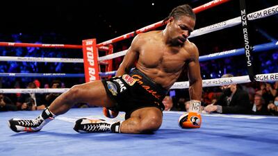 Shawn Porter lies on the mat after he was knocked down by Terence Crawford. AP Photo
