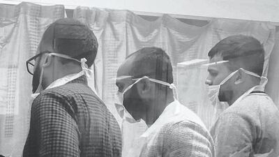 The saddest day of their lives, when their father died on the 22 March 2020. Kamrul Hasan/NPG