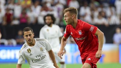 Hazard looks to close down Joshua Kimmich. Reuters