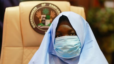 A girl who was kidnapped from a boarding school in the northwest Nigerian state of Zamfara, looks on after her release in Zamfara, Nigeria. Reuters
