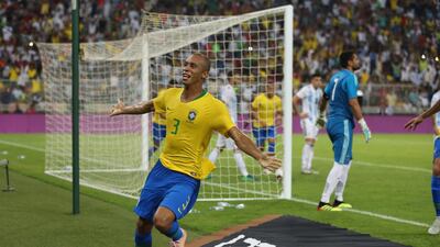 Brazil defender Miranda celebrates after scoring. AFP