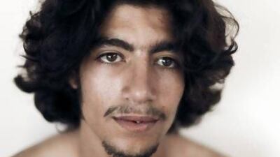The image, Yassine, Moroccan, is from Tamara Abdul Hadi's series Picture an Arab Man. Courtesy Rawiya