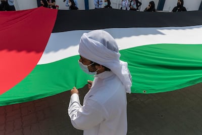 Pupils at a Dubai school celebrate Flag Day. Antonie Robertson / The National