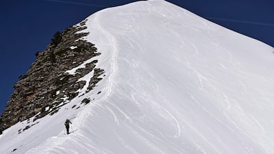 A man walks on the ridge of Mount Arlas in the Pyrenees, in the northern Spanish province of Navarre. AFP