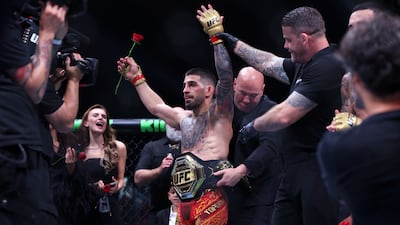 Ilia Topuria celebrates his featherweight title win in Abu Dhabi