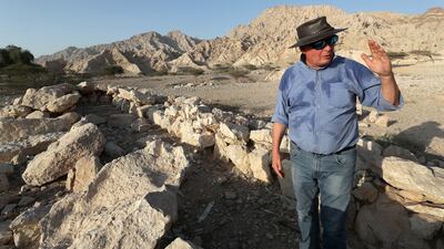 Mr Velde showing the tombs at Shimal.