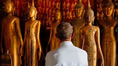 US president Barack Obama visits the Wat Xieng Thong Buddhist temple, alongside his participation in the ASEAN Summit, in Luang Prabang, Laos. Jonathan Ernst / Reuters