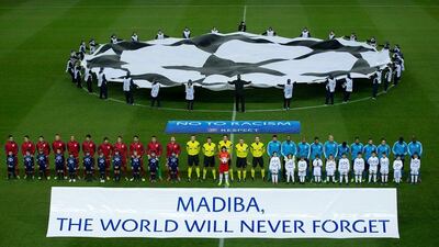 In Spain, Atletico Madrid and Porto paid their respects before play to Mandela. Gonzalo Arroyo Moreno / Getty Images