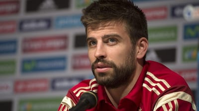 Spanish defender Gerard Pique responds to a question during a press conference in Washington, DC, USA, on Wednesday. Shawn Thew / EPA / June 4, 2014