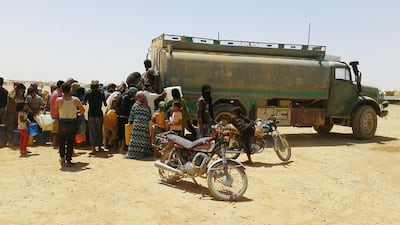 The daily drudgery of water collection at Rukban. AP Photo.