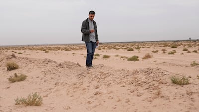 Researcher Dr Jaafar al Jotheri explores the site of the Battle of Al Qadisiyah. AP