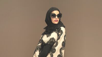 Monochrome retains its appeal in the new collection, as do oversized sunglasses