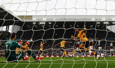 Wolves celebrate after Ruben Neves scores their third goal. Reuters