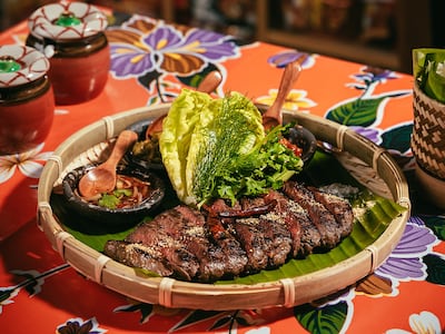 Striploin with toasted chilli, tamarind and galangal dipping sauces. Photo: Sip Song