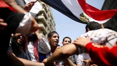 Supporters of Muslim Brotherhood presidential candidate Mohammed Morsi shout slogans during a demonstration in Cairo Friday. They want the results of the presidential election released soon.