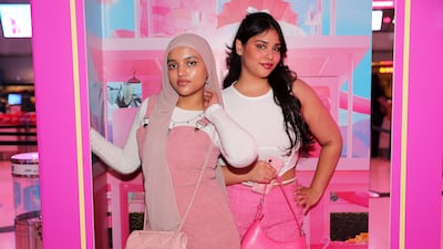 Zaha Naushad and Vafreen Farhad Patel taking their photos at the Barbie display after watching the film