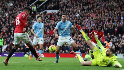 Manchester City's Gianluigi Donnarumma saves a shot from Manchester United's Casemiro. AFP