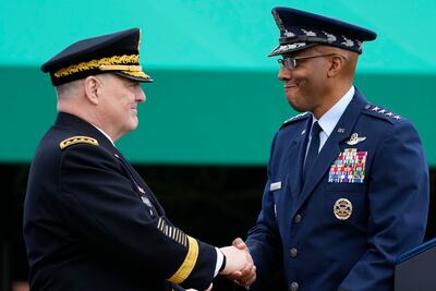 Gen Mark Milley and his successor Gen CQ Brown. AP