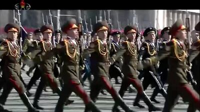 In this image made from video released by KRT, North Korean soldiers march during a military parade in Pyongyang. KRT / AP