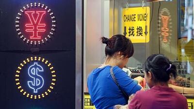 The US treasury has found that the yuan exchange rate has risen 16 per cent against the dollar since mid-2010. Mike Clarke / AFP