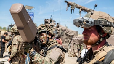 French soldiers test an anti-drone jammer. Getty Images