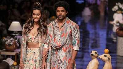 Shibani Dandekar and Farhan Akhtar walk for designer Payal Singhal during Lakme Fashion Week winter / festive 2019 in Mumbai. Photo: Sujit Jaiswal / AFP