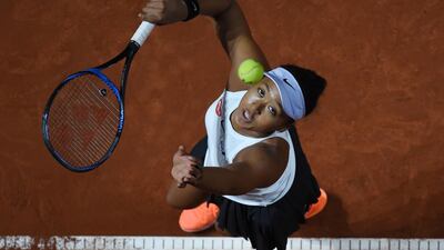 Japan's Naomi Osaka serves to Croatia's Donna Vekic during their Porsche tennis Grand Prix match in Stuttgart on Friday. Marijan Murat / AP Photo