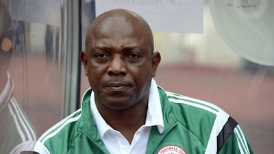 A file picture taken on October 15, 2014 shows Nigeria’s coach Stephen Keshi looking on during the 2015 Africa Cup of Nations qualifying football match between Nigeria and Sudan in Abuja. AFP PHOTO / PIUS UTOMI EKPEI