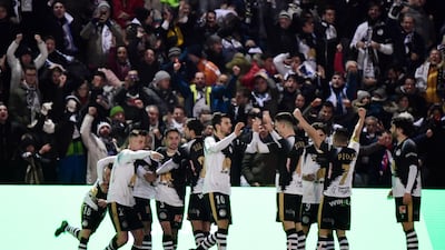 CORRECTION / Unionistas de Salamanca players celebrate their goal scored by Unionistas' Spanish forward Alvaro Romero during the Copa del Rey (King's Cup) football match between Unionistas de Salamanca CF and Real Madrid CF at Las Pistas del Helmantico stadium in Salamanca, on January 22, 2020. / AFP / JAVIER SORIANO