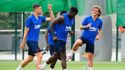 From left: Clement Lenglet, Samuel Umtiti and Antoine Griezmann take part in pre-season training. AFP