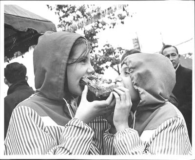 Two sisters from New Jersey share a Belgian waffle at the New York Expo on October 15, 1965. Jerry Engel / New York Post Archives
