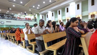 Parishioners gathered to mark Easter at St Therese Church in Abu Dhabi. Victor Besa / The National