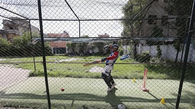 A cricketer bats during a nets session at the Baluwatar Cricket Club training centre in Kathmandu, Nepal. Pawan Singh / The National