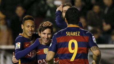 Neymar, left, Lionel Messi, centre, and Luis Suarez have provided the goals that have put Barcelona in prime position for a second successive treble. Sergio Perez / Reuters